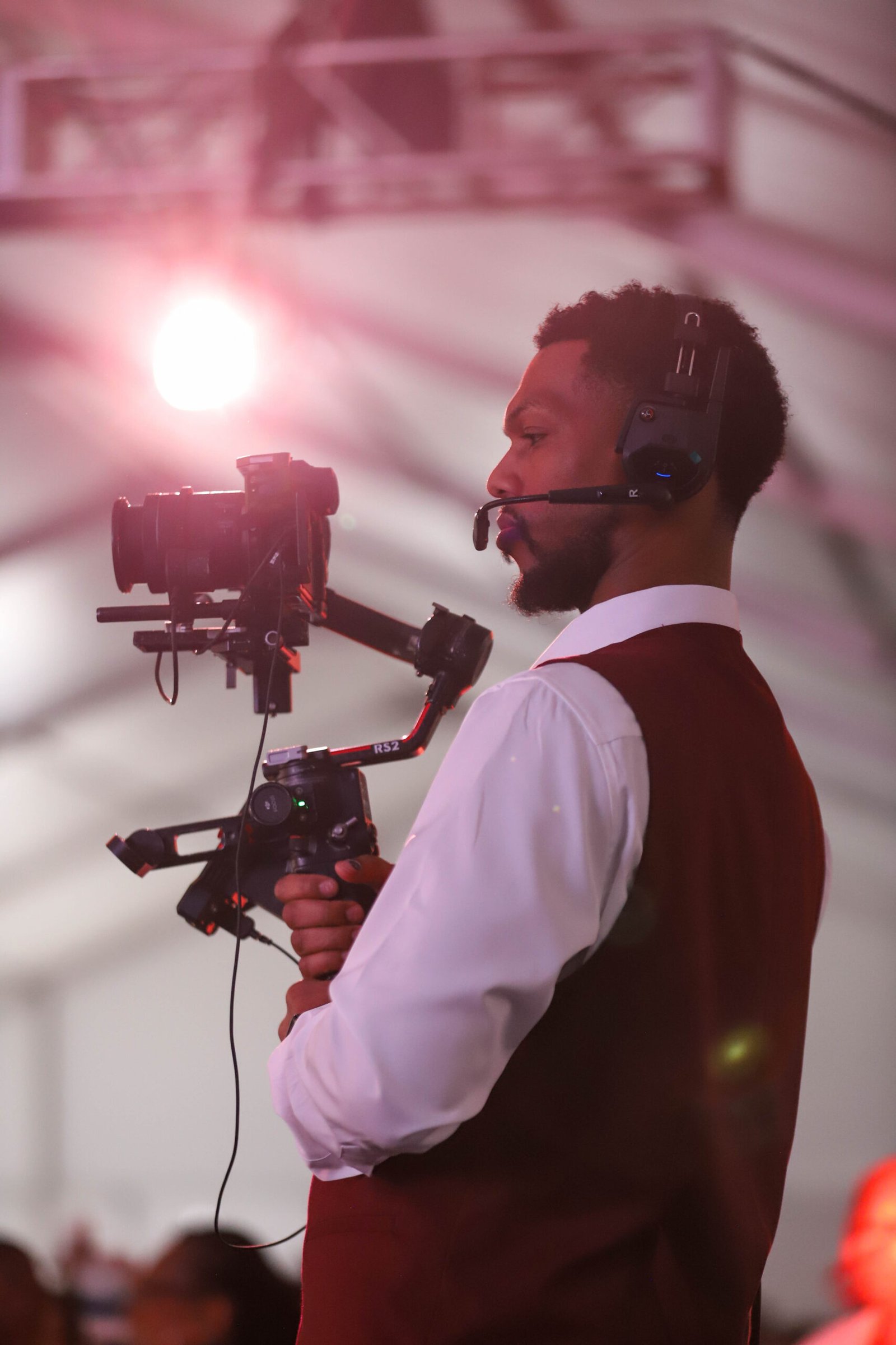 Production professional working behind the camera.